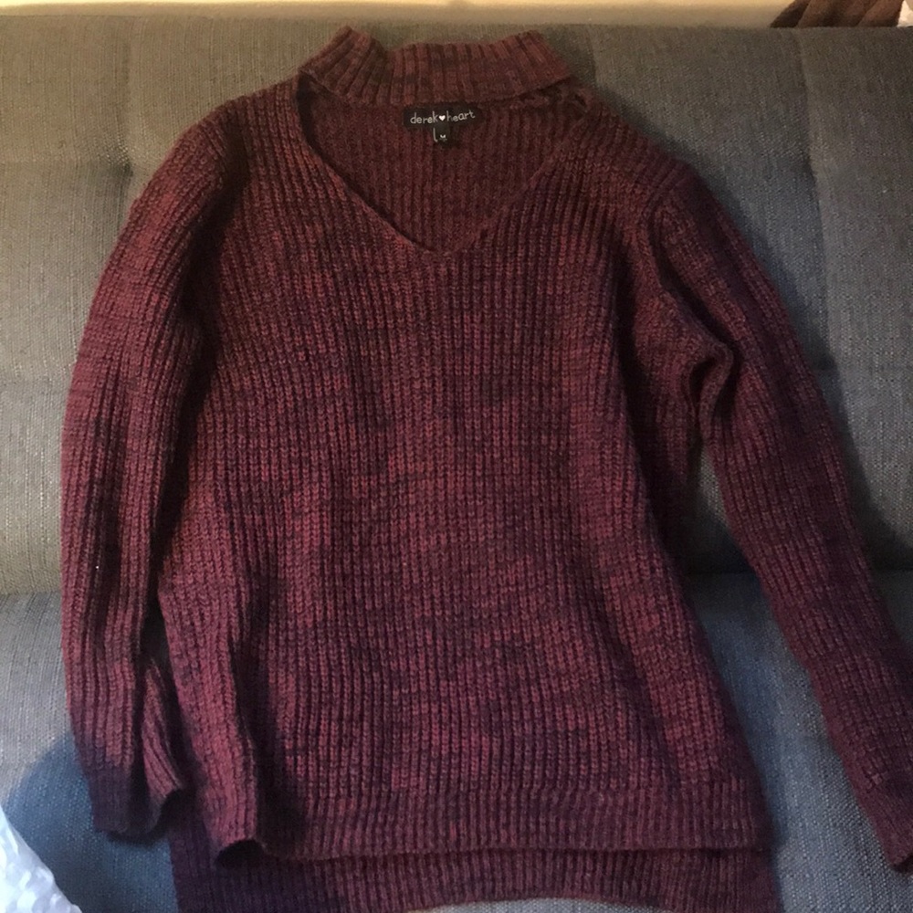 Maroon sweater, neck cut out